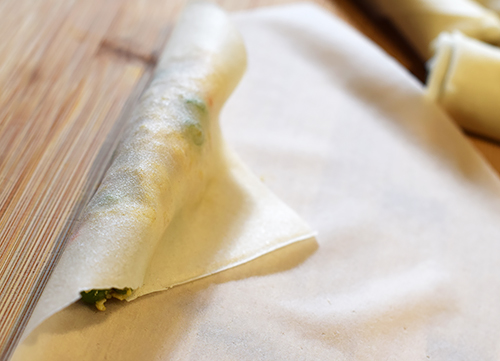 Begin wrapping the spring roll
